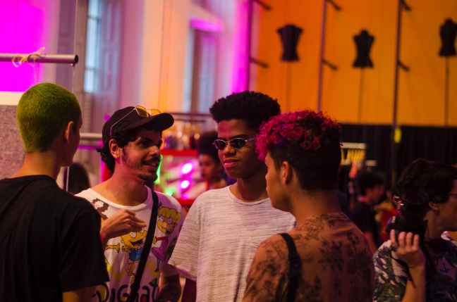 four men facing each others